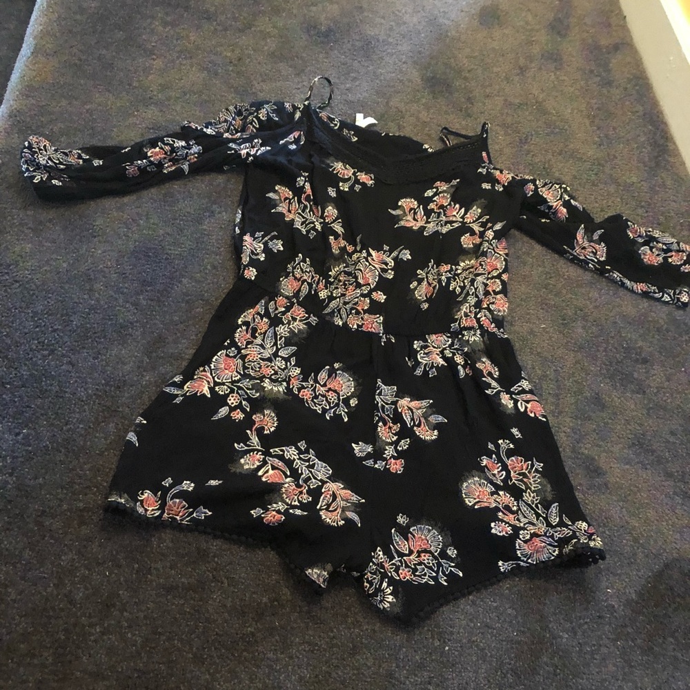 MUDD long sleeved floral romper.